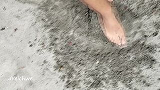 playing with my feet on the beach