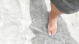 playing with my feet on the beach