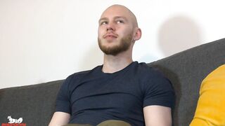 Orson spits on his cock and begins stroking it slowly