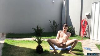 Adorable twink Henry Evans cums while masturbating outdoors