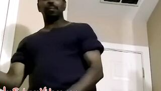 Black thug smokes and works on his massive ebony cock