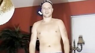 Muscly white masculine guy watches porn and jerks off his dick