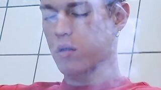 Beautiful jock smokes cigars while masturbating and cumming