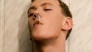 Big dick blond soccer twink Roma smokes cigs while wanking