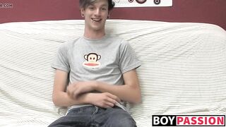 Adorable gay guy Danny jerks off his dick on couch solo