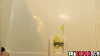 Good looking twink plays with his dick in the shower solo