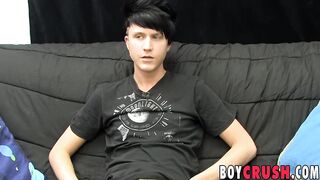 Young gay man jerks off his giant dick during an interview