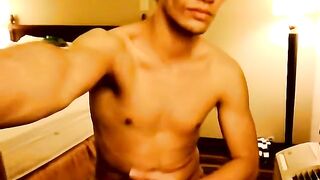 Super hot young man jerking off and making his dick cum