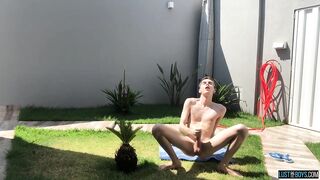 Adorable twink Henry Evans cums while masturbating outdoors