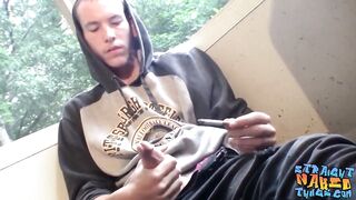 Homosexual thug takes a smoke outdoors and jacks off