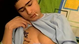 Chain smoking twink tugging and squirting creamy cum