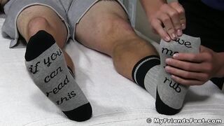 Inked hunk Clint has socks and feet sucked while jerking off