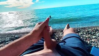 Skinny Twink Sucks off a Big Dick of a Stranger Jerking off on a Beach