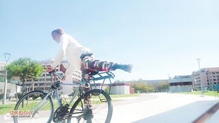 Young Man with His Bicycle Pees