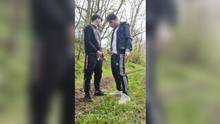 Two hot, horny boys smoking and wanking their dicks outdoors