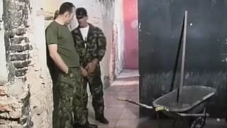 Soldiers rendezvous to an abandoned building to make out and masturbate