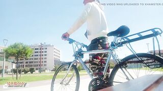 Very Handsome Young Man on a Bicycle and Urinates on the Street