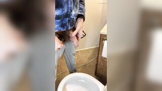 Side view of my very hairy big uncut dick pissing in the toilet