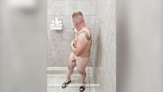 Ginger takes a shower in the gym