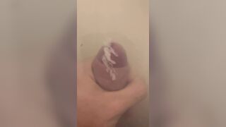 Uncut white dick pissing, masturbating, and cumming underwater in the bathtub, then plays with it