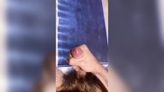 Very hairy big white uncut dick jerking off and cumming on a glowing light table