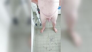 Naked urination in the dirty shower