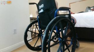 Handicapped guy wheels around hotel room naked in wheelchair