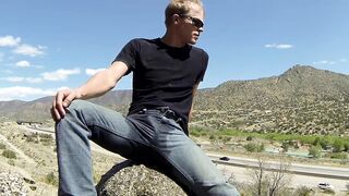 Wetting jeans and white briefs near a highway