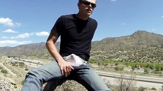 Wetting jeans and white briefs near a highway