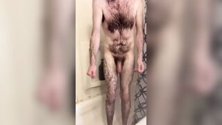 Skinny hairy white dude with a big uncut cock takes a quick shower