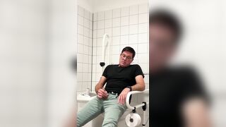 Jerking off in a public restroom at the medical building. Unedited