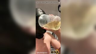 Devilbondageslave in chastity drinking his own piss